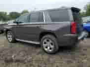 2015 Chevrolet Tahoe LTZ with VIN 1GNSKCKC0FR232105, listed as a Copart auction lot 84635255 with 152,360 mi miles and Salvage title. Bid and sale history available at DreamBid. Image 2.