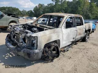 2017 Chevrolet Silverado 1500 LT with VIN 3GCUKREC3HG466998, listed as a Copart auction lot 80644725 with Not provided miles and Salvage title. Bid and sale history available at DreamBid. Image 1.