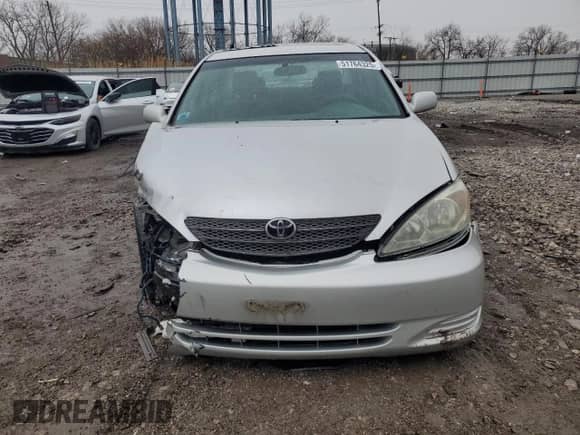 2004 Toyota Camry LE z VIN 4T1BE32K54U902762, wystawiony jako Copart lot #51764325 z przebiegiem 213 940 mil mil oraz Szkoda całkowita • Salvage title. Historia ofert i sprzedaży dostępna na DreamBid. Obrazek 5.