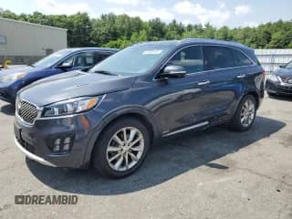 2017 Kia Sorento SXL z VIN 5XYPKDA50HG235336, wystawiony jako Copart lot #61569195 z przebiegiem 86 025 mil mil oraz Szkoda całkowita • Salvage title. Historia ofert i sprzedaży dostępna na DreamBid. Obrazek 1.