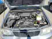 2002 Subaru Forester S with VIN JF1SF65612H743803, listed as a Copart auction lot 58748725 with 67,381 mi miles and Clean title. Bid and sale history available at DreamBid. Image 12.