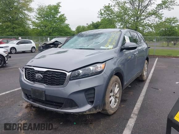 2020 Kia Sorento LX with VIN 5XYPGDA30LG648964, listed as a IAAI auction lot 42219602 with 71,781 mi miles and . Bid and sale history available at DreamBid. Image 2.