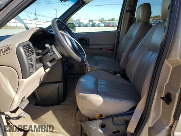 2004 Chevrolet Venture LT with VIN 1GNDX13E74D105294, listed as a Copart auction lot 74743294 with 111,928 mi miles and Salvage title. Bid and sale history available at DreamBid. Image 7.