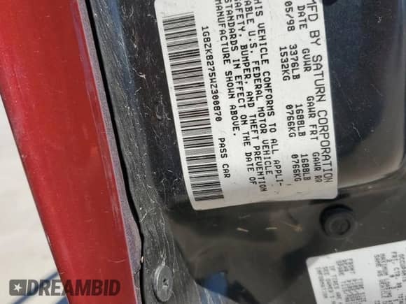 1998 Saturn SW with VIN 1G8ZK8275WZ300870, listed as a Copart auction lot 73472674 with 36,550 mi miles and Salvage title. Bid and sale history available at DreamBid. Image 12.