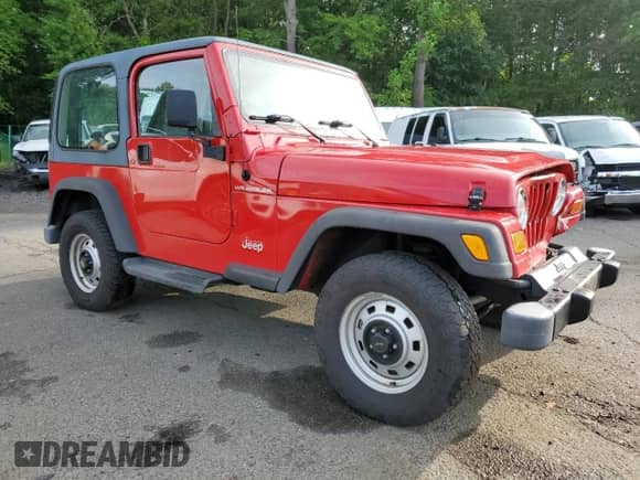 2000 Jeep Wrangler SE with VIN 1J4FA29P8YP711686, listed as a Copart auction lot 68999455 with 100,108 mi miles and Salvage title. Bid and sale history available at DreamBid. Image 4.