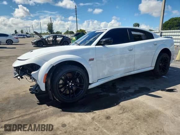 2023 Dodge Charger Scat Pack z VIN 2C3CDXGJ2PH646143, wystawiony jako Copart lot #85075215 z przebiegiem 31 823 mil mil oraz Nie do naprawy • Non repairable. Historia ofert i sprzedaży dostępna na DreamBid. Obrazek 1.