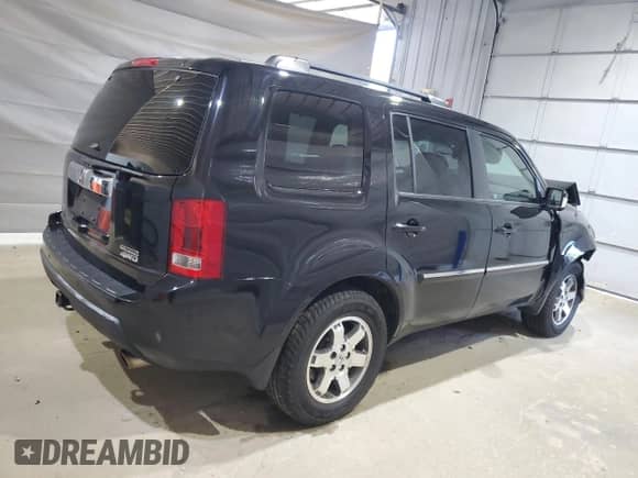 2010 Honda Pilot Touring с VIN 5FNYF4H91AB033815, выставлен на аукционе Copart как лот 65589255 с пробегом 197 143 миль миль и Списание • Salvage title. История ставок и продаж доступна на DreamBid. Изображение 3.