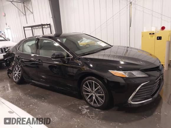 2023 Toyota Camry Hybrid XLE z VIN 4T1F31AK5PU611888, wystawiony jako IAAI lot #41304654 z przebiegiem 40 140 mil mil oraz . Historia ofert i sprzedaży dostępna na DreamBid. Obrazek 13.