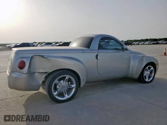 2005 Chevrolet SSR LS с VIN 1GCES14H75B114899, выставлен на аукционе Copart как лот 56712515 с пробегом 99 359 миль миль и Списание • Salvage title. История ставок и продаж доступна на DreamBid. Изображение 3.