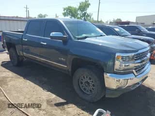 2017 Chevrolet Silverado 1500 LTZ z VIN 3GCPCSEC4HG470723, wystawiony jako IAAI lot #42248303 z przebiegiem 124 371 mil mil oraz . Historia ofert i sprzedaży dostępna na DreamBid. Obrazek 1.