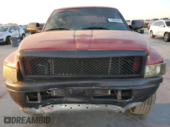2000 Dodge 1500 z VIN 3B7HC12Y8YG120199, wystawiony jako Copart lot #74834464 z przebiegiem 218 439 mil mil oraz Szkoda całkowita • Salvage title. Historia ofert i sprzedaży dostępna na DreamBid. Obrazek 5.