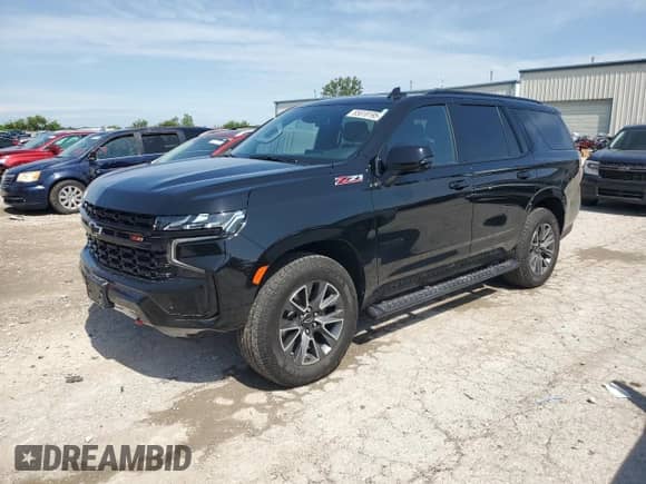 2024 Chevrolet Tahoe Z71 with VIN 1GNSKPKD3RR119897, listed as a Copart auction lot 65618195 with 28,171 mi miles and Salvage title. Bid and sale history available at DreamBid. Image 1.