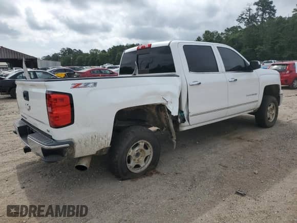 2015 Chevrolet Silverado 1500 LTZ with VIN 3GCUKSEC0FG143710, listed as a Copart auction lot 52581215 with 167,421 mi miles and Salvage title. Bid and sale history available at DreamBid. Image 3.