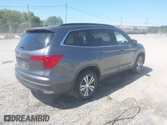 2018 Honda Pilot EX-L with VIN 5FNYF5H50JB006656, listed as a IAAI auction lot 43179982 with 130,515 mi miles and . Bid and sale history available at DreamBid. Image 4.