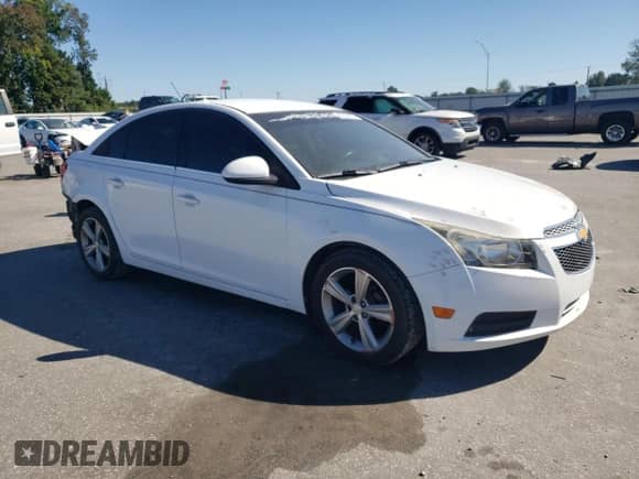 2015 Chevrolet Cruze LT with VIN 1G1PE5SB9F7250650, listed as a Copart auction lot 82333875 with 138,492 mi miles and Salvage title. Bid and sale history available at DreamBid. Image 4.