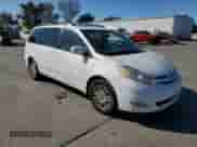 2010 Toyota Sienna XLE с VIN 5TDYK4CC3AS310667, выставлен на аукционе Copart как лот 86077205 с пробегом 184 017 миль миль и Списание • Salvage title. История ставок и продаж доступна на DreamBid. Изображение 4.