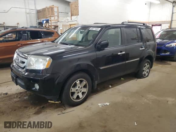2010 Honda Pilot Touring with VIN 5FNYF4H85AB031685, listed as a Copart auction lot 80077405 with 178,943 mi miles and Salvage title. Bid and sale history available at DreamBid. Image 1.