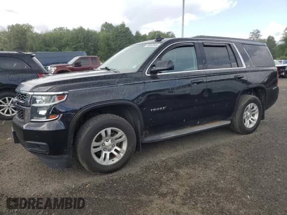 2015 Chevrolet Tahoe LS with VIN 1GNSKAKC9FR538918, listed as a Copart auction lot 70853545 with 121,718 mi miles and Clean title. Bid and sale history available at DreamBid. Image 1.