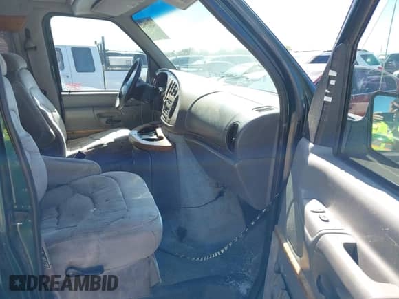 1999 Ford Econoline Cargo Recreational with VIN 1FDRE14L4XHA60812, listed as a IAAI auction lot 42127942 with 176,964 mi miles and . Bid and sale history available at DreamBid. Image 5.