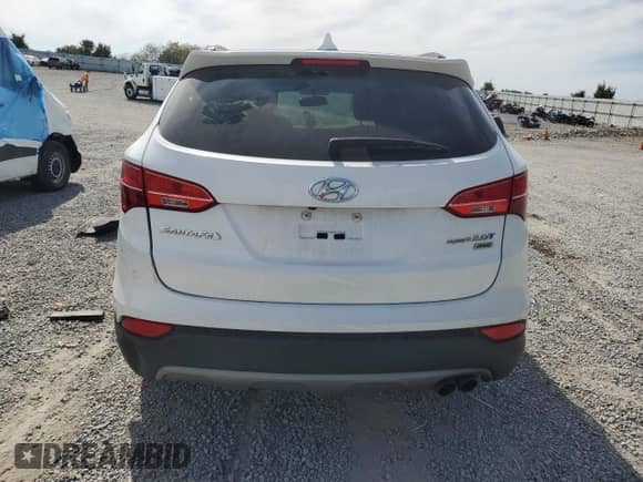 2014 Hyundai Santa Fe with VIN 5XYZUDLA2EG202069, listed as a Copart auction lot 70583405 with 190,694 mi miles and Salvage title. Bid and sale history available at DreamBid. Image 6.