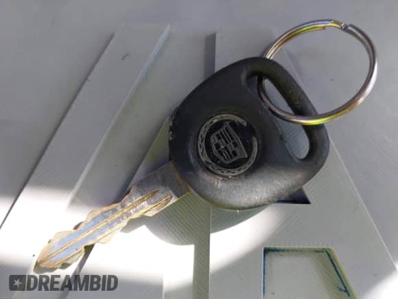 2003 Cadillac Escalade z VIN 1GYEK63N03R312419, wystawiony jako IAAI lot #43515791 z przebiegiem 162 498 mil mil oraz . Historia ofert i sprzedaży dostępna na DreamBid. Obrazek 11.