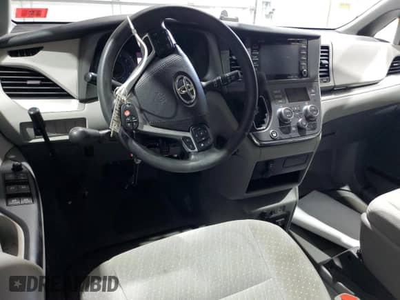 2018 Toyota Sienna LE with VIN 5TDKZ3DCXJS930409, listed as a Copart auction lot 70283005 with 7,639 mi miles and Salvage title. Bid and sale history available at DreamBid. Image 8.