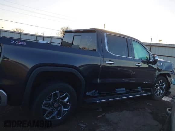 2023 GMC Sierra 1500 SLT with VIN 3GTUUDEDXPG336589, listed as a IAAI auction lot 41100545 with 24,734 mi miles and . Bid and sale history available at DreamBid. Image 14.