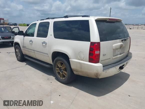 2009 Chevrolet Suburban LTZ z VIN 1GNFK36399R234676, wystawiony jako IAAI lot #42321922 z przebiegiem 419 096 mil mil oraz . Historia ofert i sprzedaży dostępna na DreamBid. Obrazek 3.