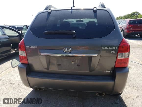 2009 Hyundai Tucson Limited with VIN KM8JN72DX9U945490, listed as a Copart auction lot 57984315 with 121,117 mi miles and Salvage title. Bid and sale history available at DreamBid. Image 6.