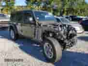 2022 Jeep Wrangler Unlimited Sahara Altitude with VIN 1C4HJXEG0NW255878, listed as a Copart auction lot 41437565 with 33,328 mi miles and Non repairable. Bid and sale history available at DreamBid. Image 4.