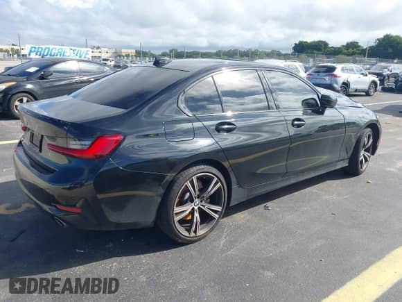 2020 BMW 3 Series 330i with VIN 3MW5R1J03L8B13416, listed as a IAAI auction lot 43323003 with 52,942 mi miles and . Bid and sale history available at DreamBid. Image 4.