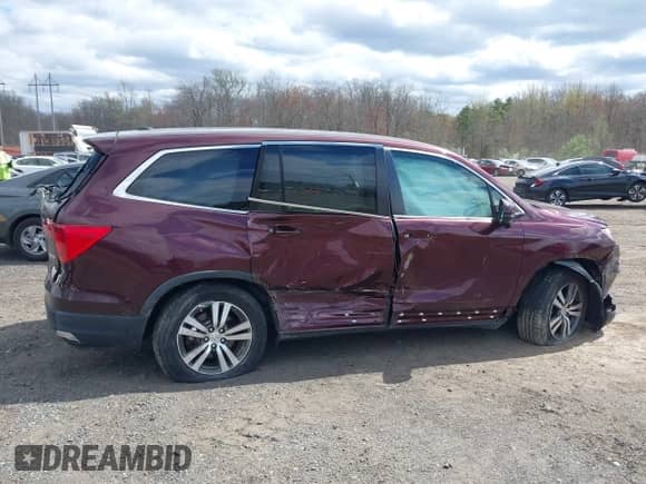 2017 Honda Pilot EX-L with VIN 5FNYF6H74HB040889, listed as a IAAI auction lot 42040094 with 84,001 mi miles and . Bid and sale history available at DreamBid. Image 18.