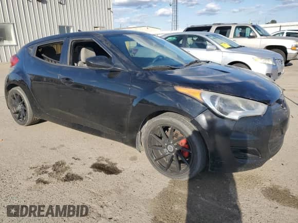 2013 Hyundai Veloster w/Black Int z VIN KMHTC6AD8DU147119, wystawiony jako Copart lot #82261415 z przebiegiem 132 516 mil mil oraz Szkoda całkowita • Salvage title. Historia ofert i sprzedaży dostępna na DreamBid. Obrazek 4.