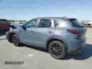 2024 Mazda CX-5 S Carbon Edition z VIN JM3KFBCM0R0369883, wystawiony jako Copart lot #67634595 z przebiegiem 25 085 mil mil oraz Szkoda całkowita • Salvage title. Historia ofert i sprzedaży dostępna na DreamBid. Obrazek 2.
