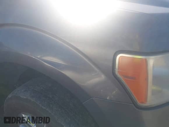 2013 Ford F-150 Lariat with VIN 1FTFW1ET5DKE51436, listed as a IAAI auction lot 43459885 with 149,455 mi miles and . Bid and sale history available at DreamBid. Image 6.