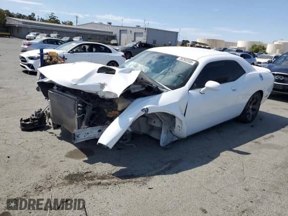 2019 Dodge Challenger SXT with VIN 2C3CDZAG0KH727725, listed as a Copart auction lot 70292555 with 90,100 mi miles and Salvage title. Bid and sale history available at DreamBid. Image 1.