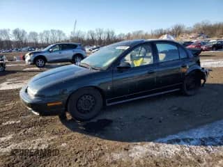 1996 Saturn SL with VIN 1G8ZK5279TZ274736, listed as a Copart auction lot 42434145 with 93,315 mi miles and Salvage title. Bid and sale history available at DreamBid. Image 1.