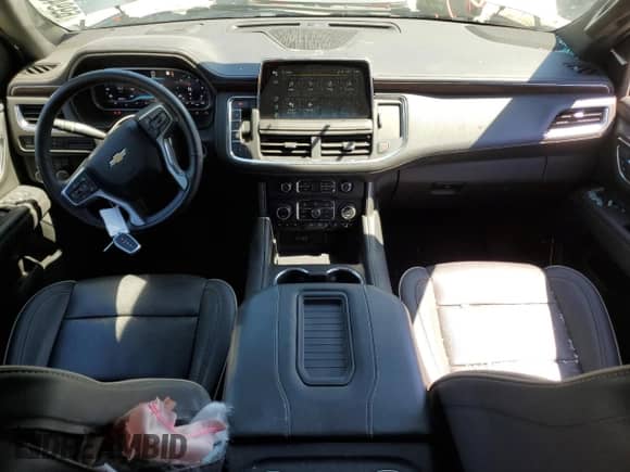 2023 Chevrolet Suburban Premier z VIN 1GNSCFKD5PR279364, wystawiony jako Copart lot #69945035 z przebiegiem 62 418 mil mil oraz Czysty tytuł • Clean title. Historia ofert i sprzedaży dostępna na DreamBid. Obrazek 8.