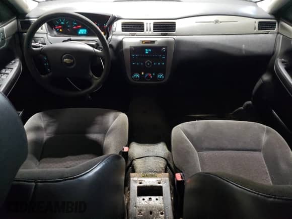2013 Chevrolet Impala Police z VIN 2G1WD5E3XD1243509, wystawiony jako Copart lot #66715925 z przebiegiem 158 766 mil mil oraz Szkoda całkowita • Salvage title. Historia ofert i sprzedaży dostępna na DreamBid. Obrazek 8.