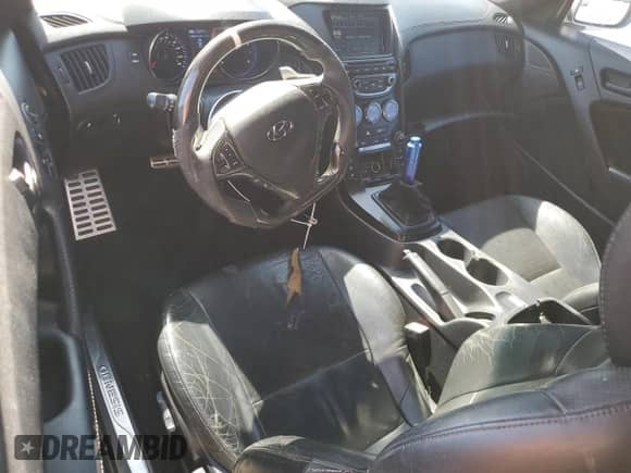 2013 Hyundai Genesis Coupe Grand Touring с VIN KMHHU6KJ1DU103423, выставлен на аукционе Copart как лот 82465725 с пробегом 133 998 миль миль и Списание • Salvage title. История ставок и продаж доступна на DreamBid. Изображение 8.