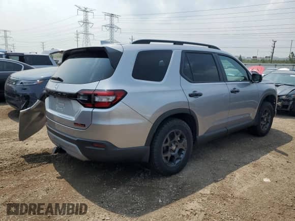 2025 Honda Pilot TrailSport with VIN 5FNYG1H61SB108032, listed as a Copart auction lot 66151355 with 3,935 mi miles and Salvage title. Bid and sale history available at DreamBid. Image 3.