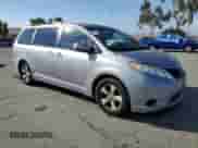 2013 Toyota Sienna LE AAS with VIN 5TDKK3DC7DS349751, listed as a Copart auction lot 80394155 with 145,235 mi miles and Salvage title. Bid and sale history available at DreamBid. Image 4.