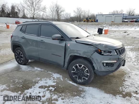 2021 Jeep Compass Trailhawk with VIN 3C4NJDDB8MT553610, listed as a Copart auction lot 45709735 with 96,602 mi miles and Salvage title. Bid and sale history available at DreamBid. Image 4.