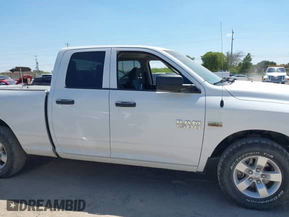 2014 Ram 1500 Express z VIN 1C6RR7FT2ES450002, wystawiony jako IAAI lot #43137160 z przebiegiem 210 027 mil mil oraz . Historia ofert i sprzedaży dostępna na DreamBid. Obrazek 13.