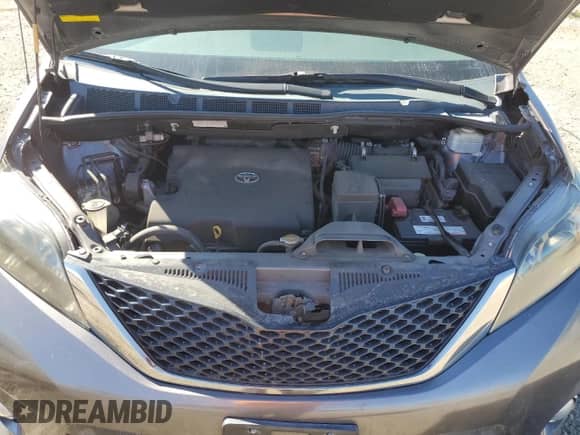 2012 Toyota Sienna SE z VIN 5TDXK3DC5CS239687, wystawiony jako Copart lot #71195805 z przebiegiem 115 143 mil mil oraz Szkoda całkowita • Salvage title. Historia ofert i sprzedaży dostępna na DreamBid. Obrazek 12.