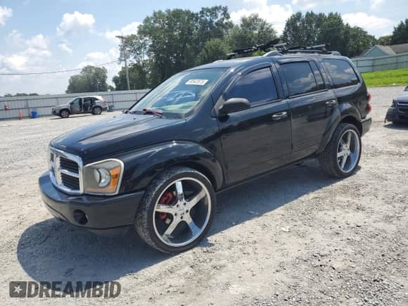 2004 Dodge Durango SLT with VIN 1D4HD48N54F167491, listed as a Copart auction lot 69542875 with 255,637 mi miles and Salvage title. Bid and sale history available at DreamBid. Image 1.