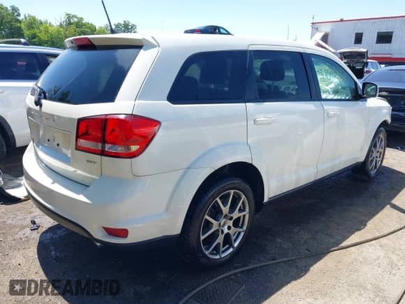 2018 Dodge Journey GT with VIN 3C4PDDEG5JT390520, listed as a IAAI auction lot 42370420 with 79,223 mi miles and . Bid and sale history available at DreamBid. Image 4.