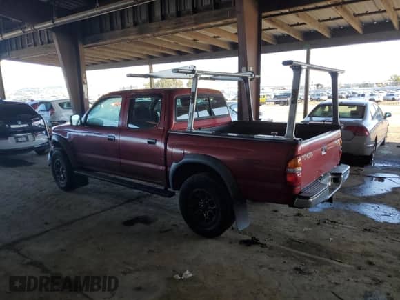2002 Toyota Tacoma PreRunner с VIN 5TEGM92N72Z071828, выставлен на аукционе Copart как лот 43996335 с пробегом 162 264 миль миль и Списание • Salvage title. История ставок и продаж доступна на DreamBid. Изображение 2.