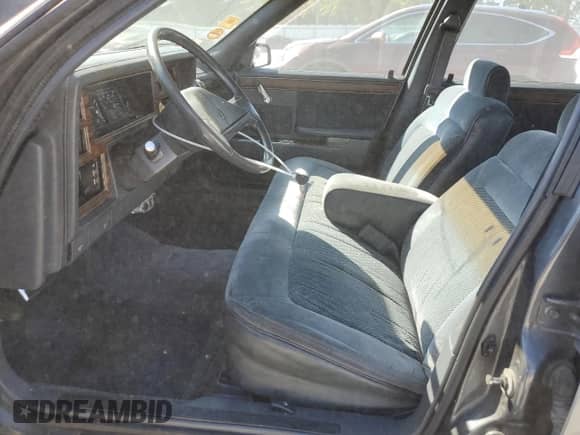 1989 Dodge Dynasty with VIN 1B3BC4632KD615753, listed as a Copart auction lot 64080955 with 54,020 mi miles and Salvage title. Bid and sale history available at DreamBid. Image 7.