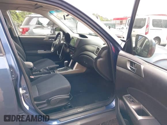 2012 Subaru Forester X Premium z VIN JF2SHADC5CH412689, wystawiony jako IAAI lot #42771071 z przebiegiem 143 409 mil mil oraz . Historia ofert i sprzedaży dostępna na DreamBid. Obrazek 5.